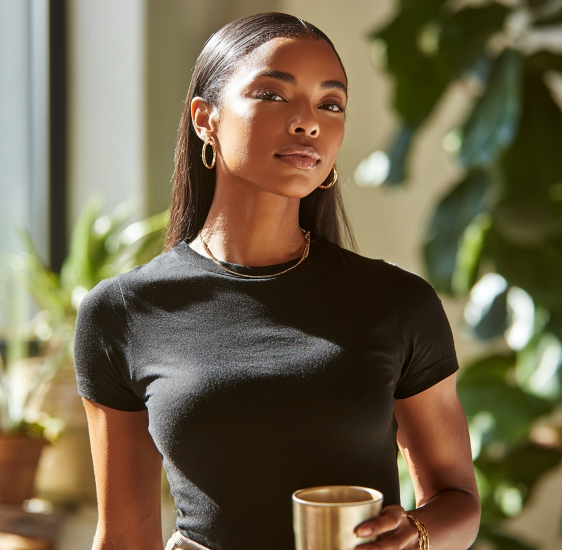 black woman drinking hormone balance tea